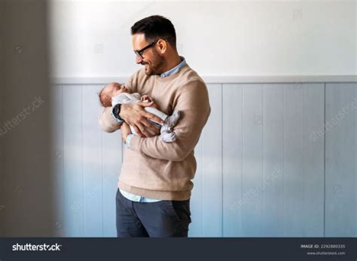 A baby in father's hands A baby in father's hands