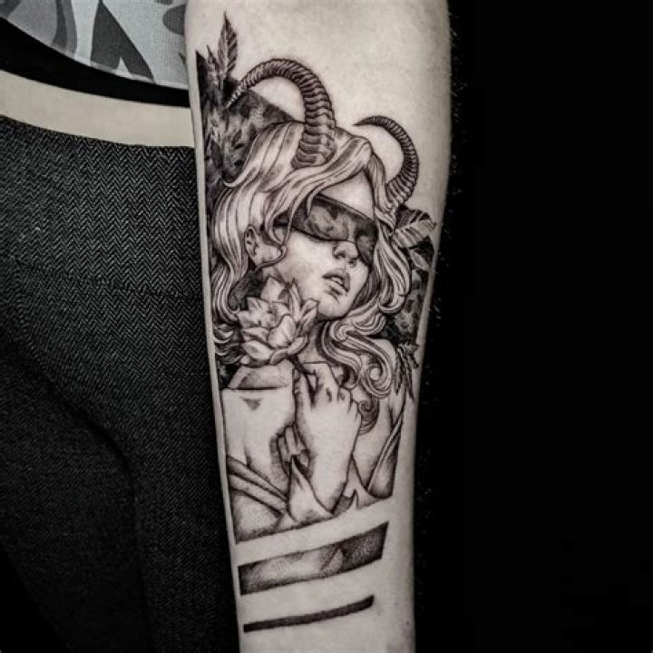 Blindfolded succubus tattoo