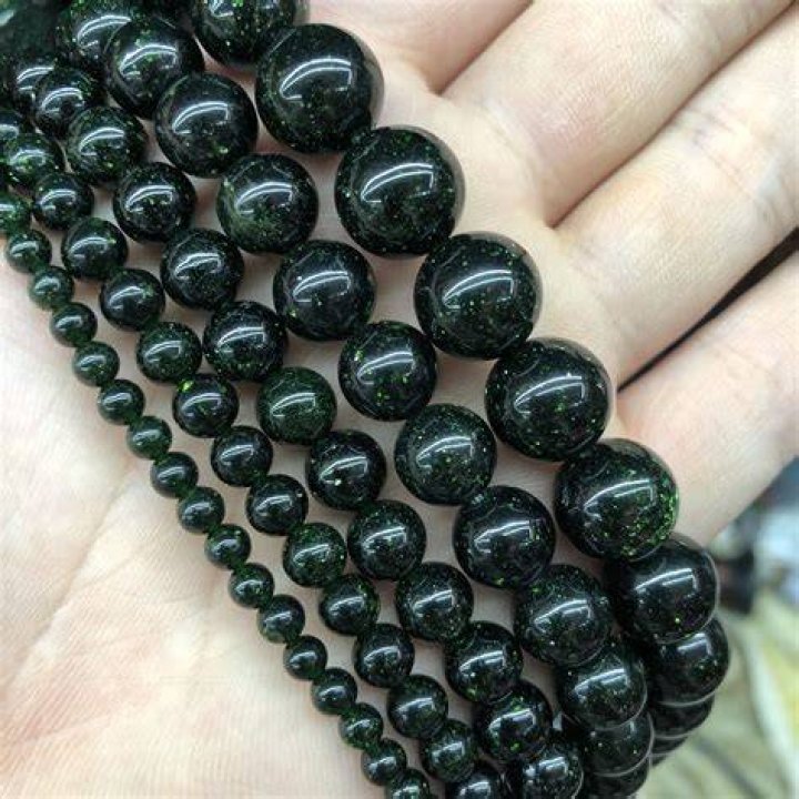 Dark green beads Dark green beads
